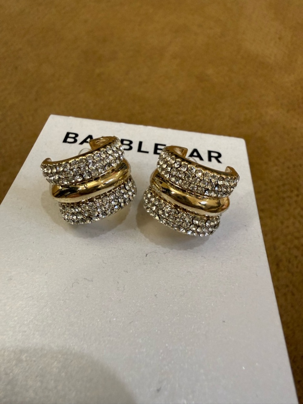 BaubleBar Gold and Clear Crystal Pavé Triple-Row Huggie Earrings